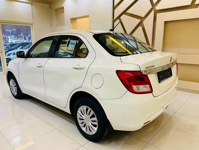 Used Suzuki DZire III Facelift, 1.2 l, 2025 in UAE, Sharjah by AlHamoor, White color. GCC Specs | AUTO.AE | Listing #295146 — photo 11 of 14