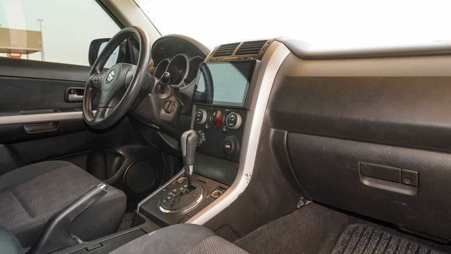 Подержанный Suzuki Grand Vitara II Рестайлинг 2, 2.4 л, 2015 в Шардже от Abo Saif Черный цвет. GCC | AUTO.AE