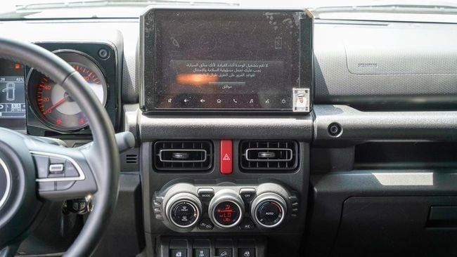 Used Suzuki Jimny IV, 1.5 l, 2024 in Sharjah by Alnujoom Al Malakiah Used Cars, White color. GCC Specs | AUTO.AE