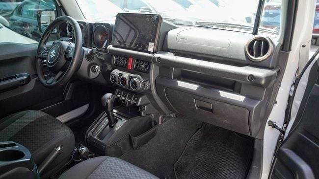 Used Suzuki Jimny IV, 1.5 l, 2024 in Sharjah by Alnujoom Al Malakiah Used Cars, White color. GCC Specs | AUTO.AE
