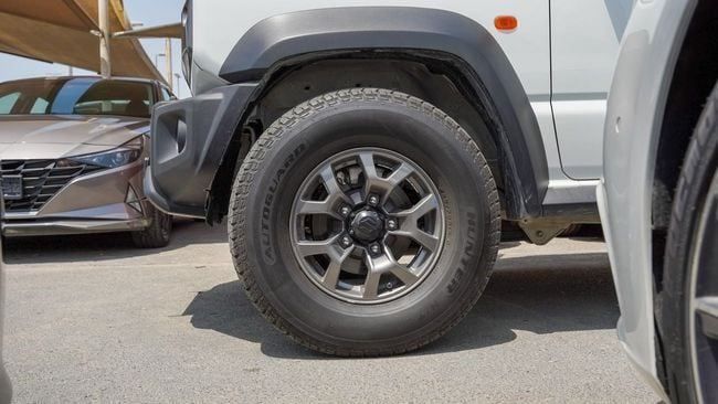 Used Suzuki Jimny IV, 1.5 l, 2024 in Sharjah by Alnujoom Al Malakiah Used Cars, White color. GCC Specs | AUTO.AE