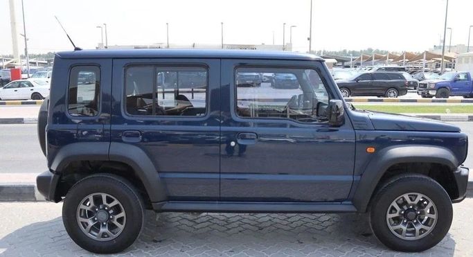 Used Suzuki Jimny IV, 1.5 l, 2024 in Sharjah by Al Sayed Khamis Used Cars, Blue color. GCC Specs | AUTO.AE