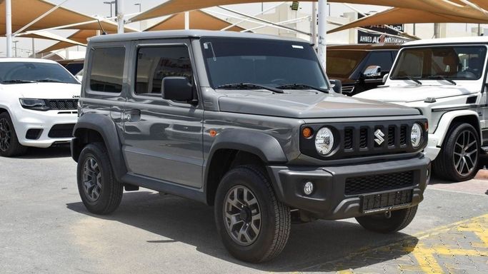 Used Suzuki Jimny IV, 1.5 l, 2024 in Sharjah by Almalakyah Cars, Grey color. GCC Specs | AUTO.AE | Listing #267430