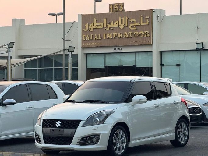 Used Suzuki Swift V, 1.4 l, 2016 in Sharjah by Titanium Used Cars, White color. GCC Specs | AUTO.AE