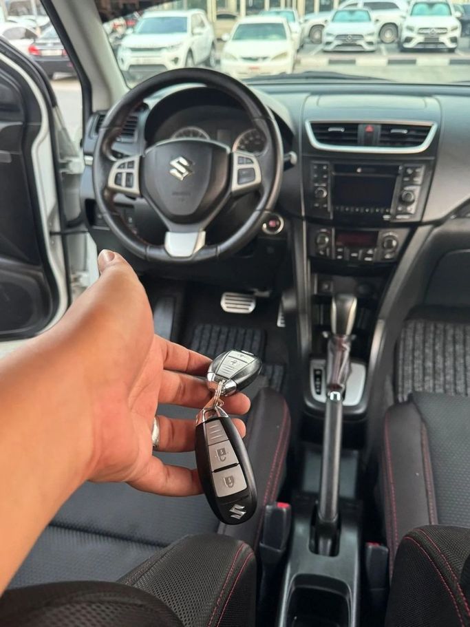 Used Suzuki Swift V, 1.4 l, 2016 in Sharjah by Titanium Used Cars, White color. GCC Specs | AUTO.AE