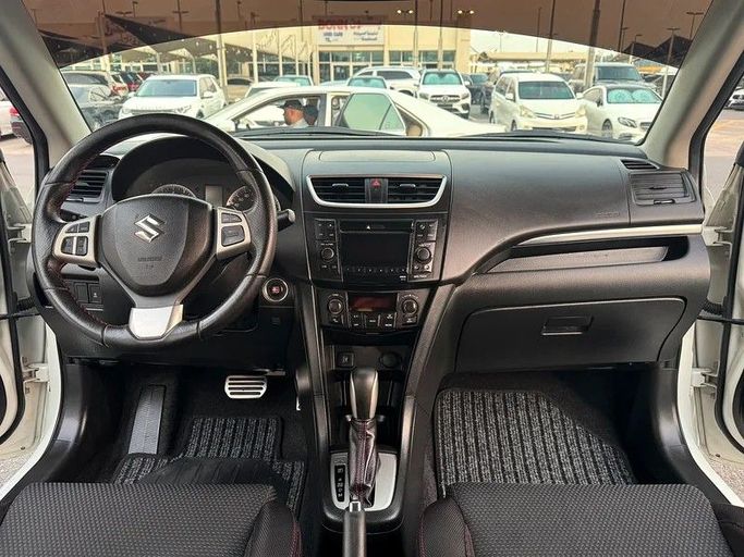 Подержанный Suzuki Swift V, 1.4 л, 2016 в Шардже от Taj Al Impratoor Used Cars Белый цвет. GCC | AUTO.AE