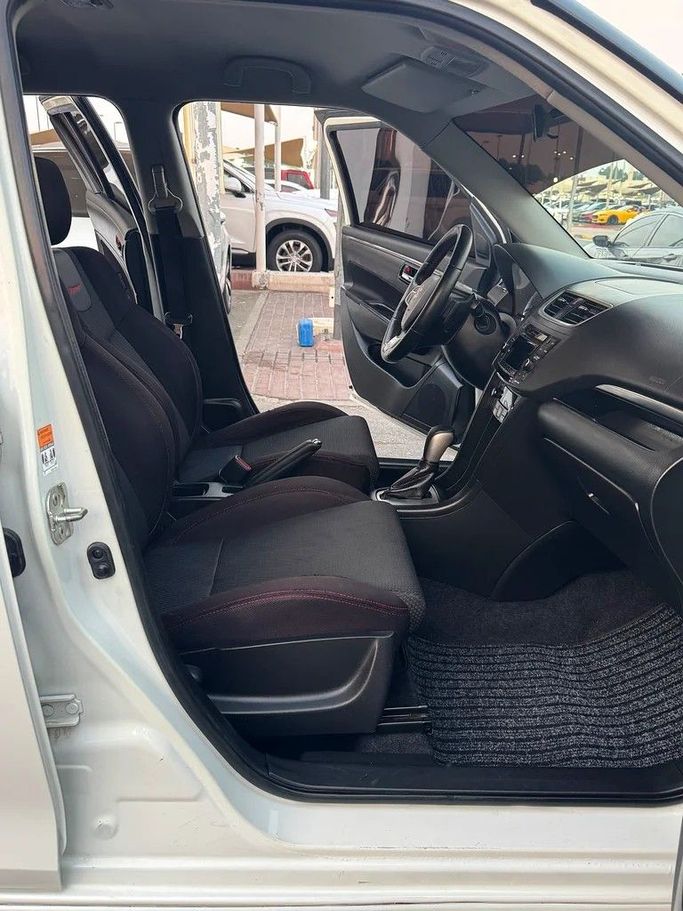 Подержанный Suzuki Swift V, 1.4 л, 2016 в Шардже от Taj Al Impratoor Used Cars Белый цвет. GCC | AUTO.AE