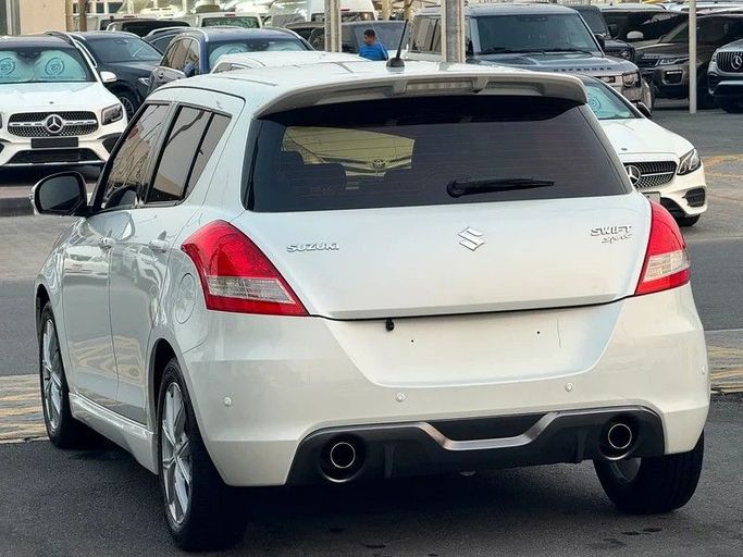 Подержанный Suzuki Swift V, 1.4 л, 2016 в Шардже от Taj Al Impratoor Used Cars Белый цвет. GCC | AUTO.AE