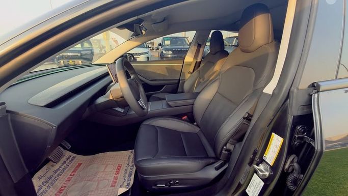 Used Tesla Model 3 Long Range I Facelift, 2024 in Sharjah by Badar Used Cars, Black color.  | AUTO.AE