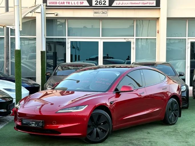 Used ⁦Tesla Model 3 Long Range I Facelift, 2025⁩ in UAE, Sharjah by Noor Al Seyoh Used Cars, Red color. GCC Specs | AUTO.AE | Listing #290257