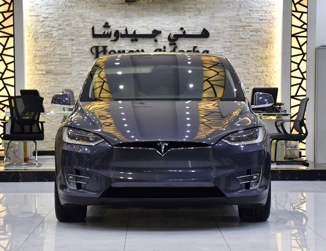 Подержанный Tesla Model X Long Range I, 2019 в Шардже от Honey Gidosha Used Cars Tr. Серый цвет.  | AUTO.AE
