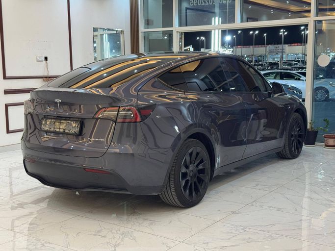Used Tesla Model Y Long Range Dual Motor I, 2023 in Sharjah by Rebou Alfakhama, Grey color. GCC Specs | AUTO.AE