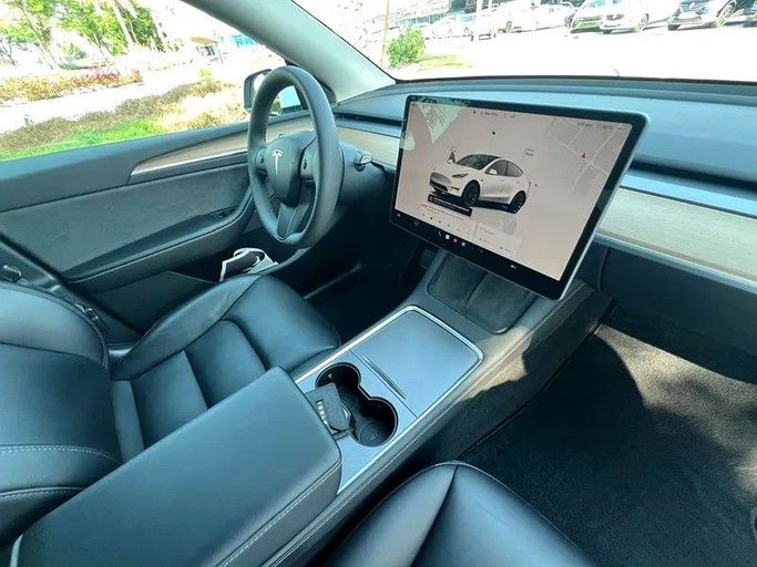 Used Tesla Model Y Long Range I, 2022 in Sharjah by First Choice Cars, White color. GCC Specs | AUTO.AE