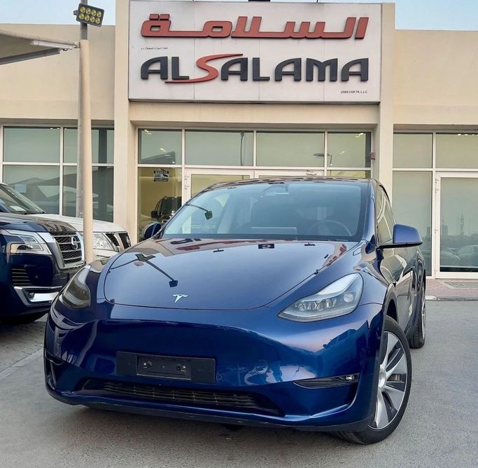 Подержанный Tesla Model Y Long Range I, 2023 в Шардже от Alsalama Motors Синий цвет. GCC | AUTO.AE