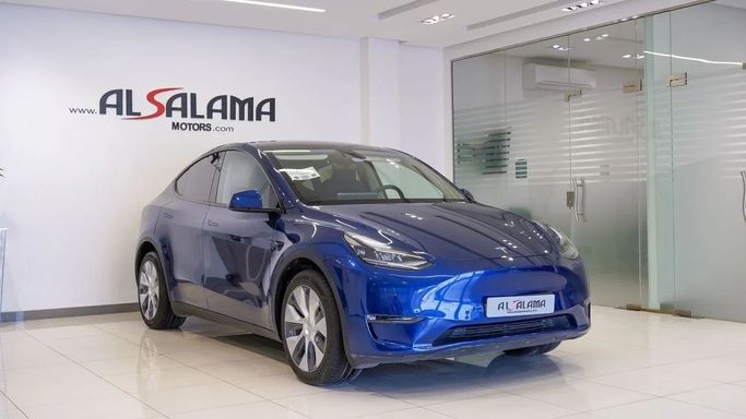 Подержанный Tesla Model Y Long Range Dual Motor I, 2023 в Шардже от Alsalama Motors Синий цвет. GCC | AUTO.AE
