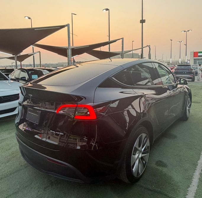 Used Tesla Model Y Long Range I, 2023 in Sharjah by Al Masah Al Malakia, Black color. American Specs | AUTO.AE