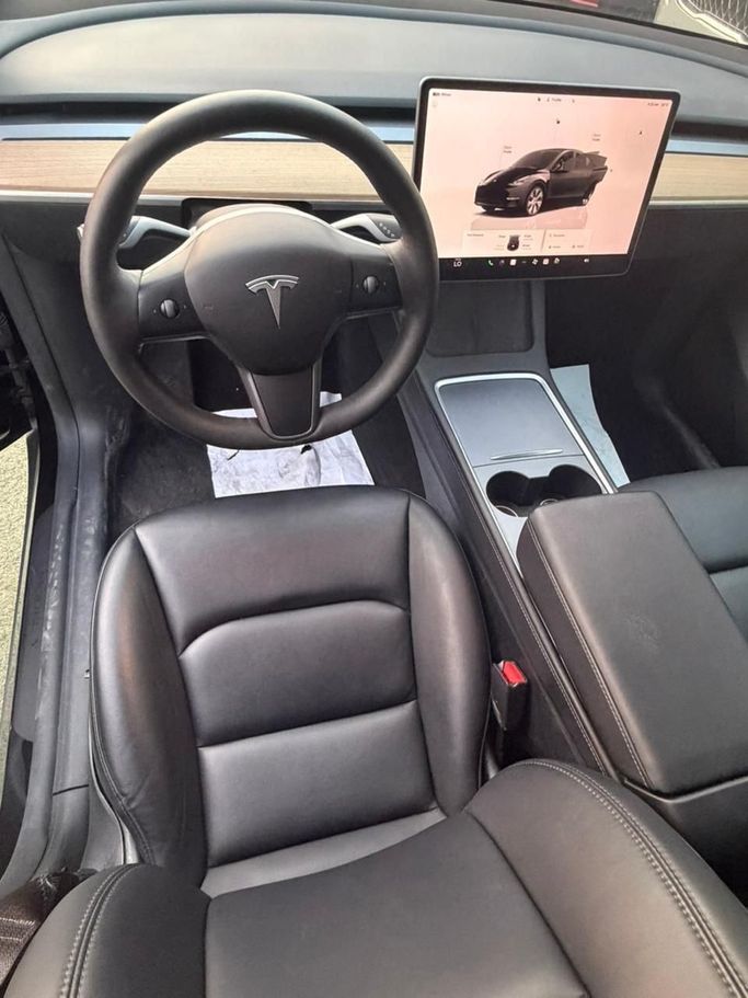 Used Tesla Model Y Long Range I, 2023 in Sharjah by Al Masah Al Malakia, Black color. American Specs | AUTO.AE