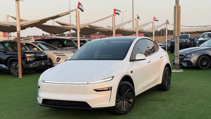 New Tesla Model Y I Facelift, 2025 in Sharjah by Badar Used Cars, White color.  | AUTO.AE