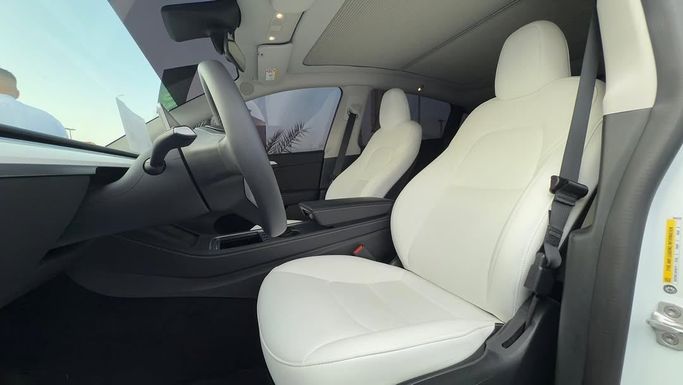 New Tesla Model Y Performance I, 2023 in Sharjah by Badar Used Cars, White color.  | AUTO.AE