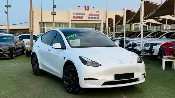 Used Tesla Model Y I, 2023 in Sharjah by Badar Used Cars, White color.  | AUTO.AE