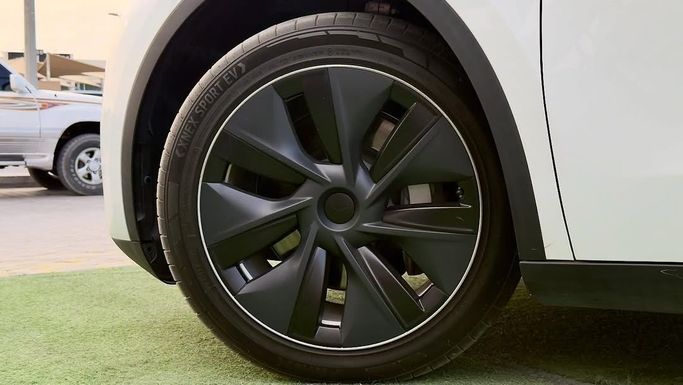 Used Tesla Model Y I, 2023 in Sharjah by Badar Used Cars, White color.  | AUTO.AE