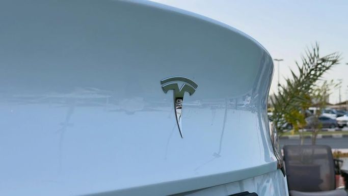 Used Tesla Model Y I, 2023 in Sharjah by Badar Used Cars, White color.  | AUTO.AE