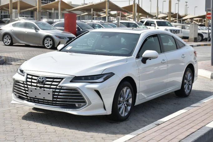 New Toyota Avalon V, 2.5 l, 2025 in Sharjah by Alfaris Used Cars, White color. Other | AUTO.AE