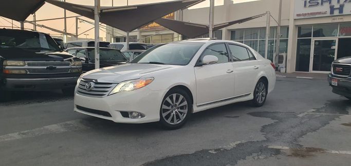 Подержанный Toyota Avalon III Рестайлинг 2, 3.5 л, 2011 в Шардже от Ishtar Used Cars Белый цвет. Other | AUTO.AE