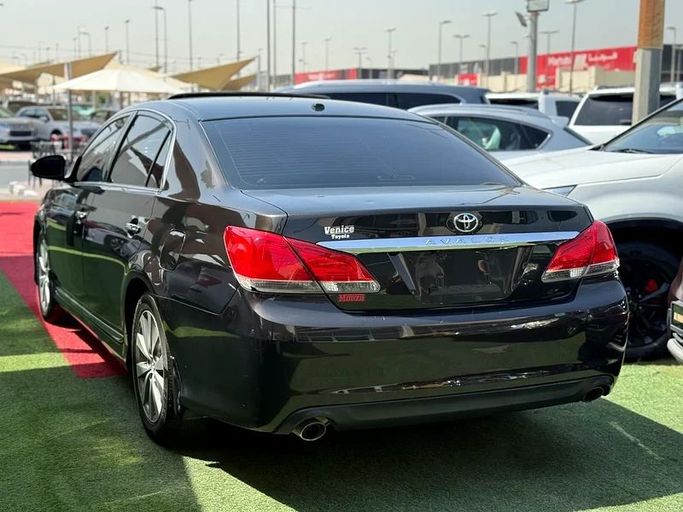 Used Toyota Avalon III Facelift 2, 3.5 l, 2011 in Sharjah by Al Muhtaref Used Cars, Black color. American Specs | AUTO.AE