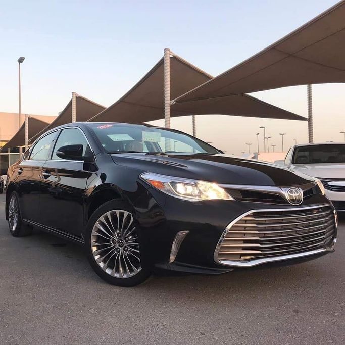 Used Toyota Avalon IV Facelift, 3.5 l, 2016 in Sharjah by Al Nukhba Al Malakyah Used Cars, Black color. American Specs | AUTO.AE