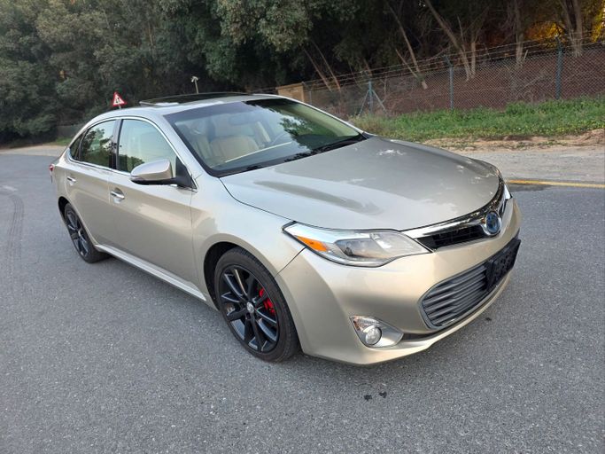 Подержанный Toyota Avalon IV, 3.5 л, 2014 в Шардже от Al Mina Used Cars Золотистый цвет. Американская | AUTO.AE