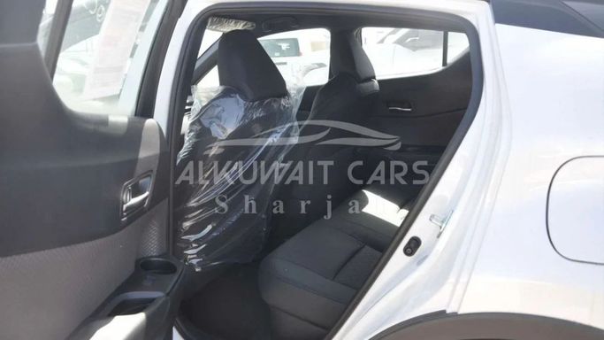 Новый Toyota C-HR I Рестайлинг, 1.8 л, 2023 в Шардже от Nour Alnukhba Motors Белый цвет. Other | AUTO.AE
