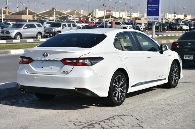 Подержанный Toyota Camry IX (XV80) China Market, 2.0 л, 2023 в Шардже от Alfaris Used Cars Белый цвет.  | AUTO.AE