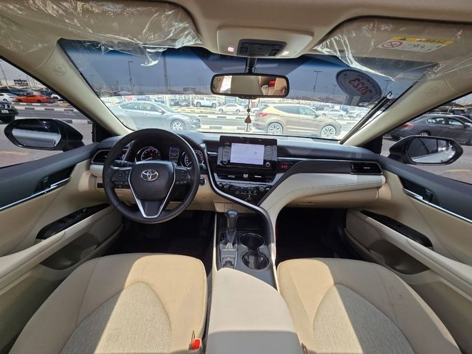 Used Toyota Camry VIII (XV70) Facelift, 2.5 l, 2023 in Sharjah by Rebou Najd Used Cars, White color. GCC Specs | AUTO.AE