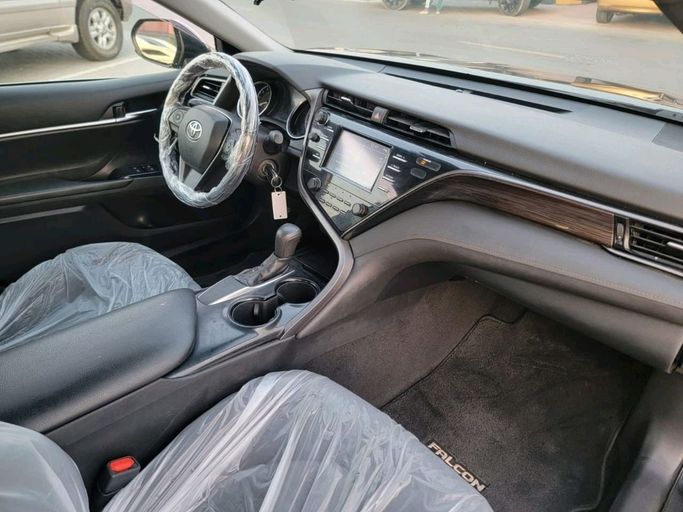 Used Toyota Camry VIII (XV70), 2.5 l, 2019 in Sharjah by Golden Deal Cars, Black color. American Specs | AUTO.AE