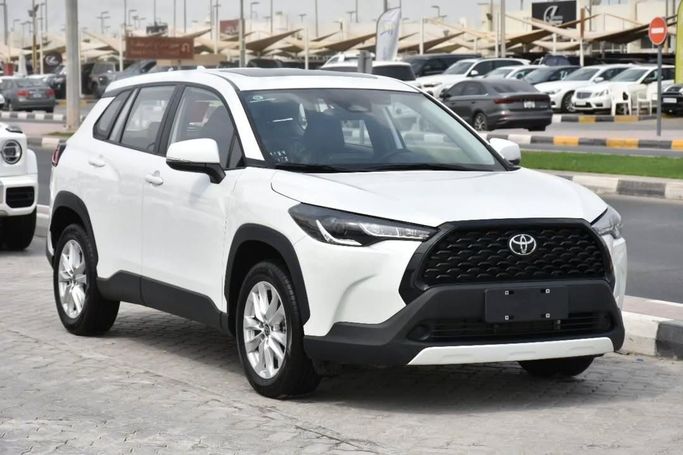 New Toyota Corolla Cross I, 2.0 l, 2025 in Sharjah by Alfaris Used Cars, White color.  | AUTO.AE