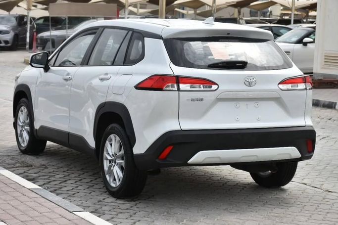 New Toyota Corolla Cross I, 2.0 l, 2025 in Sharjah by Alfaris Used Cars, White color.  | AUTO.AE
