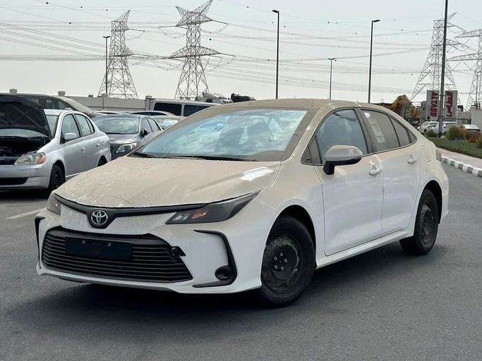 New Toyota Corolla XII (E210), 1.6 l, 2025 in Sharjah by Almarid Motors, White color. GCC Specs | AUTO.AE