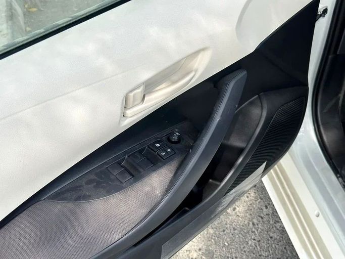 New Toyota Corolla XII (E210), 1.6 l, 2025 in Sharjah by Almarid Motors, White color. GCC Specs | AUTO.AE