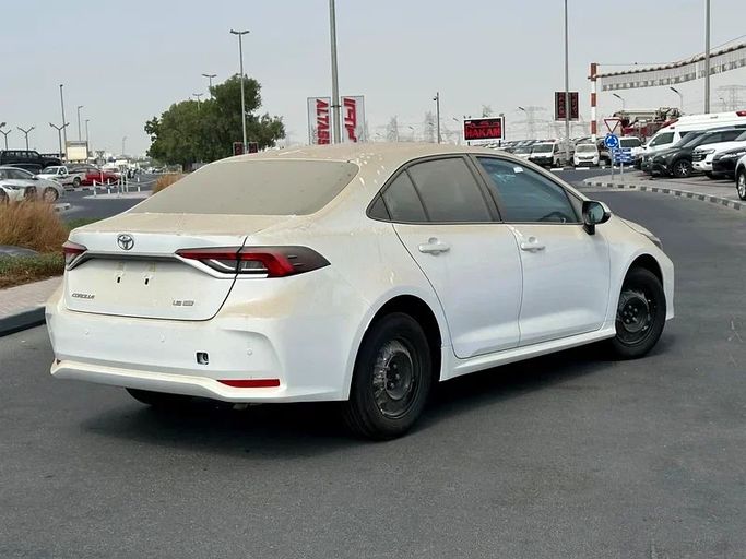 New Toyota Corolla XII (E210), 1.6 l, 2025 in Sharjah by Almarid Motors, White color. GCC Specs | AUTO.AE