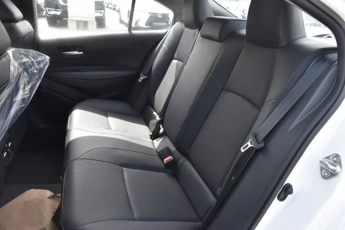 New Toyota Corolla Sporty XII (E210) Facelift, 1.8 l, 2025 in Sharjah by Alfaris Used Cars, White color.  | AUTO.AE