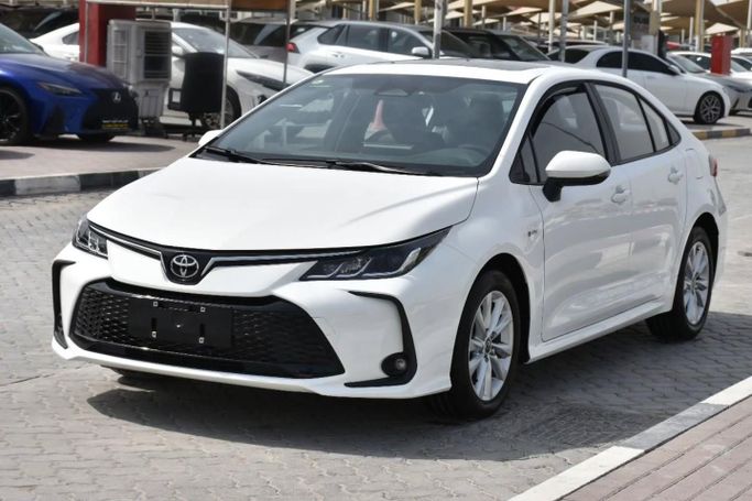 New Toyota Corolla Sporty XII (E210), 1.8 l, 2025 in Sharjah by Alfaris Used Cars, White color. Other | AUTO.AE