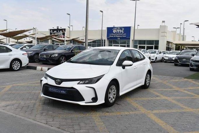 Подержанный Toyota Corolla XII (E210), 1.6 л, 2021 в Шардже от OMC Used Cars Белый цвет. GCC | AUTO.AE