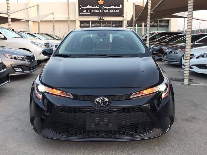 Used Toyota Corolla XII (E210), 1.8 l, 2020 in Sharjah by Al Nukhba Al Malakyah Used Cars, Black color. American Specs | AUTO.AE