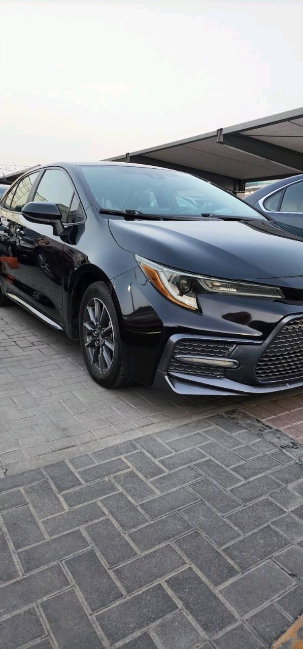 Подержанный Toyota Corolla XII (E210), 1.6 л, 2020 в Шардже от Al Najem Used Cars Черный цвет. Other | AUTO.AE