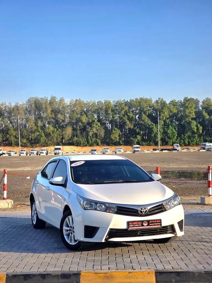 Used Toyota Corolla XI (E160, E170, E180), 1.6 l, 2014 in Sharjah by Ali Gad Ali Used Cars, White color. GCC Specs | AUTO.AE
