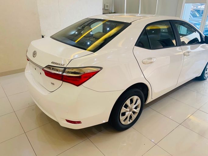 Used Toyota Corolla XI (E160, E170, E180) Facelift 1, 1.6 l, 2018 in UAE, Sharjah by AlHamoor, White color. GCC Specs | AUTO.AE | Listing #262440
