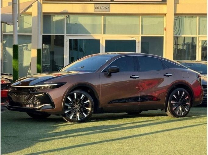 New Toyota Crown XVI (S230), 2.5 l, 2023 in Sharjah by Noor Al Seyoh Used Cars, Brown color. GCC Specs | AUTO.AE