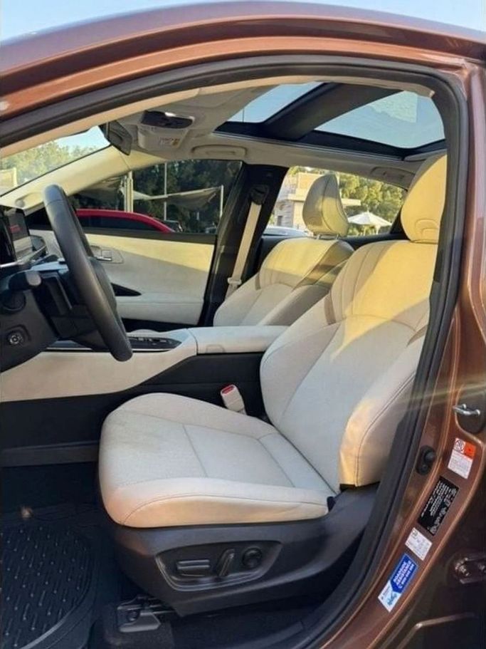 New Toyota Crown XVI (S230), 2.5 l, 2023 in Sharjah by Noor Al Seyoh Used Cars, Brown color. GCC Specs | AUTO.AE