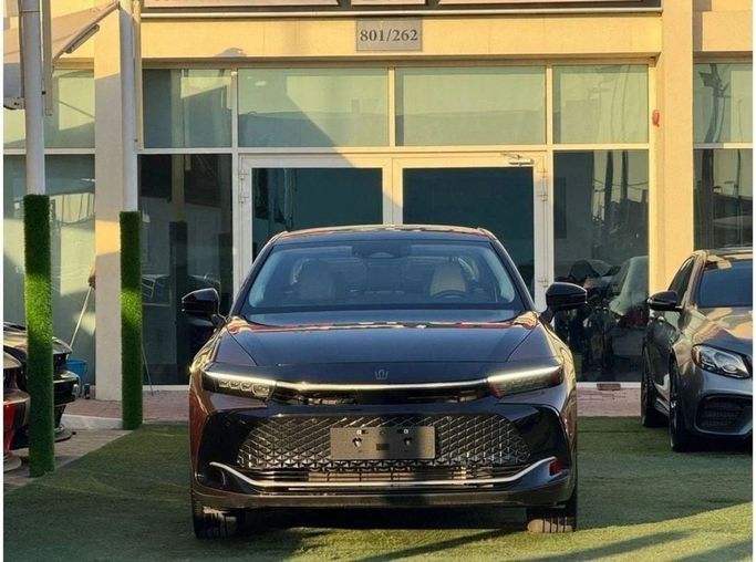 New Toyota Crown XVI (S230), 2.5 l, 2023 in Sharjah by Noor Al Seyoh Used Cars, Brown color. GCC Specs | AUTO.AE